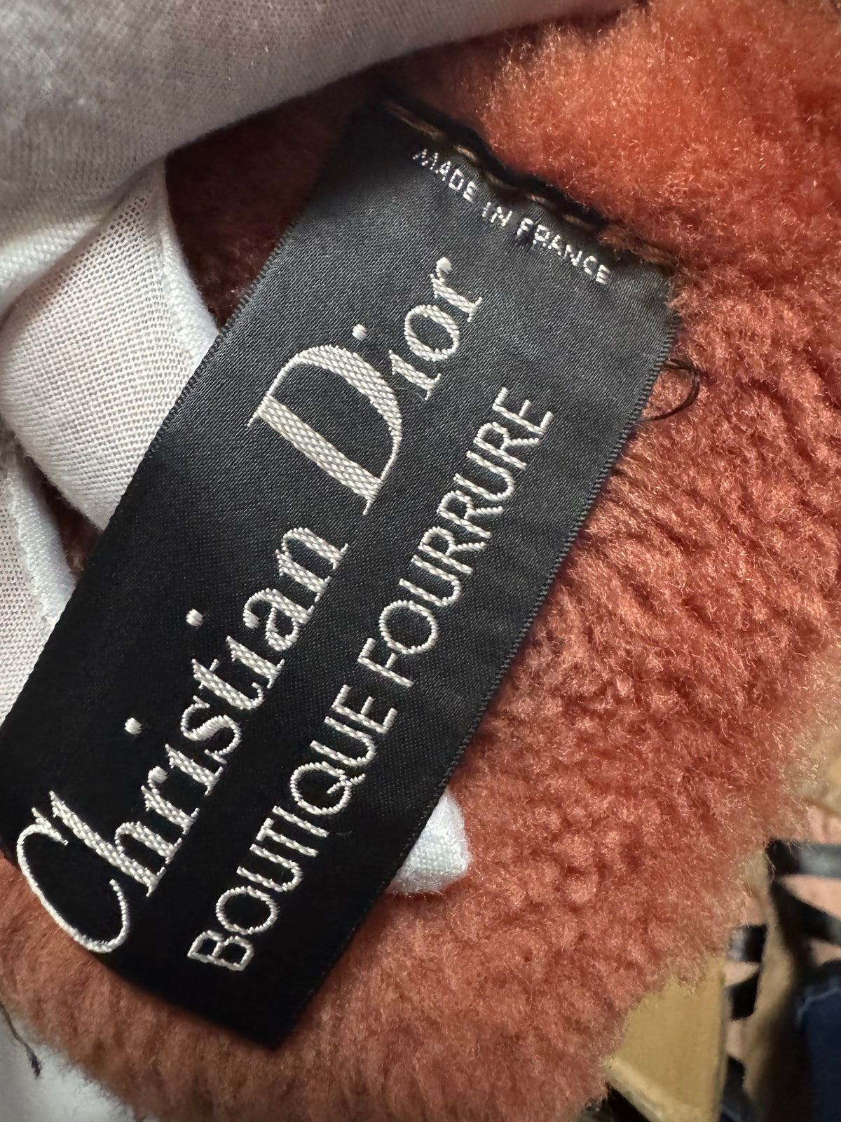 CHRISTIAN DIOR, red and peach shearling coat with gold stripes, 1970s