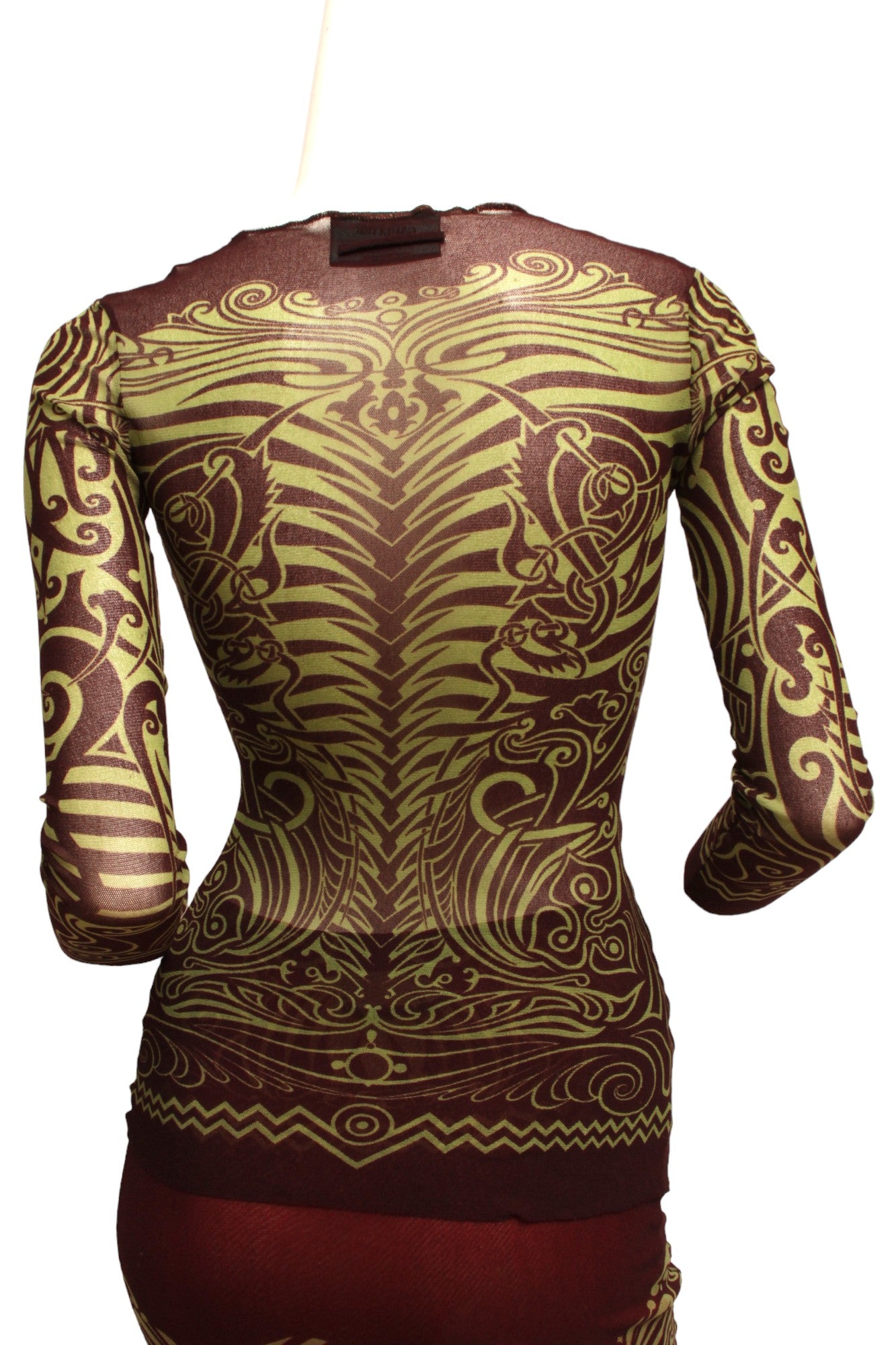 JEAN PAUL GAULTIER, Maille, MESH, 1996 S/S Tribal Maori Tattoo long sleeve brown and green top with coordinating long reversible skirt with green and brown print and orange on reverse