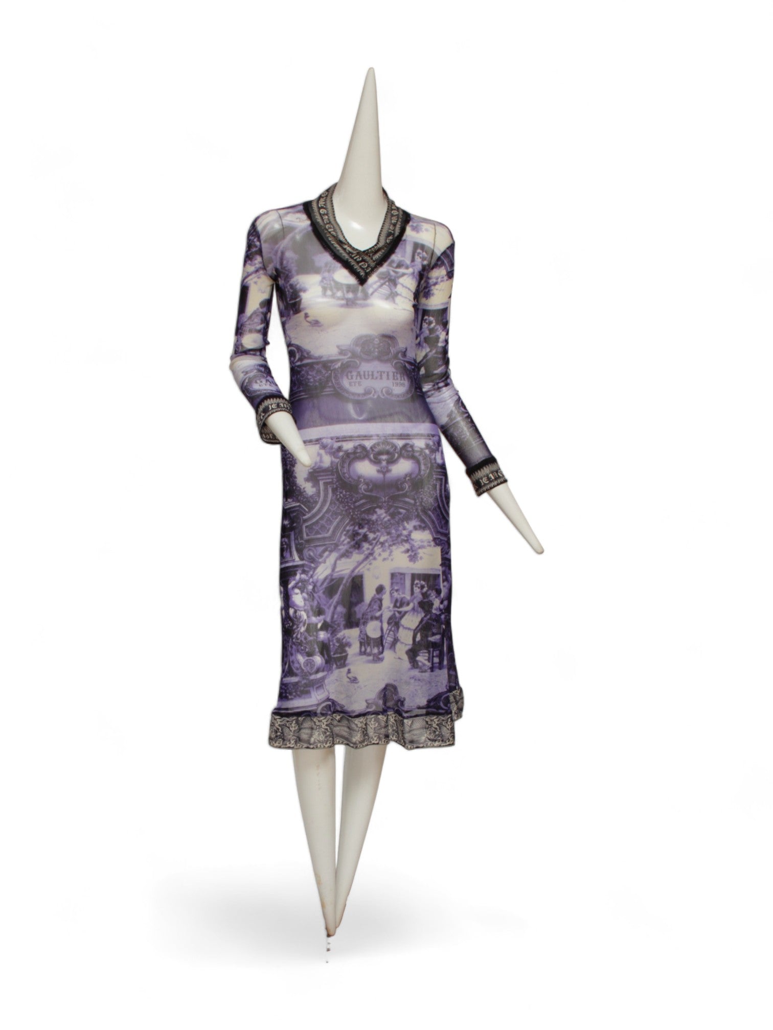 JEAN PAUL GAULTIER, French courtyard scene, long blue and white dress with black and white ruffle hem, Été (Summer) 1998