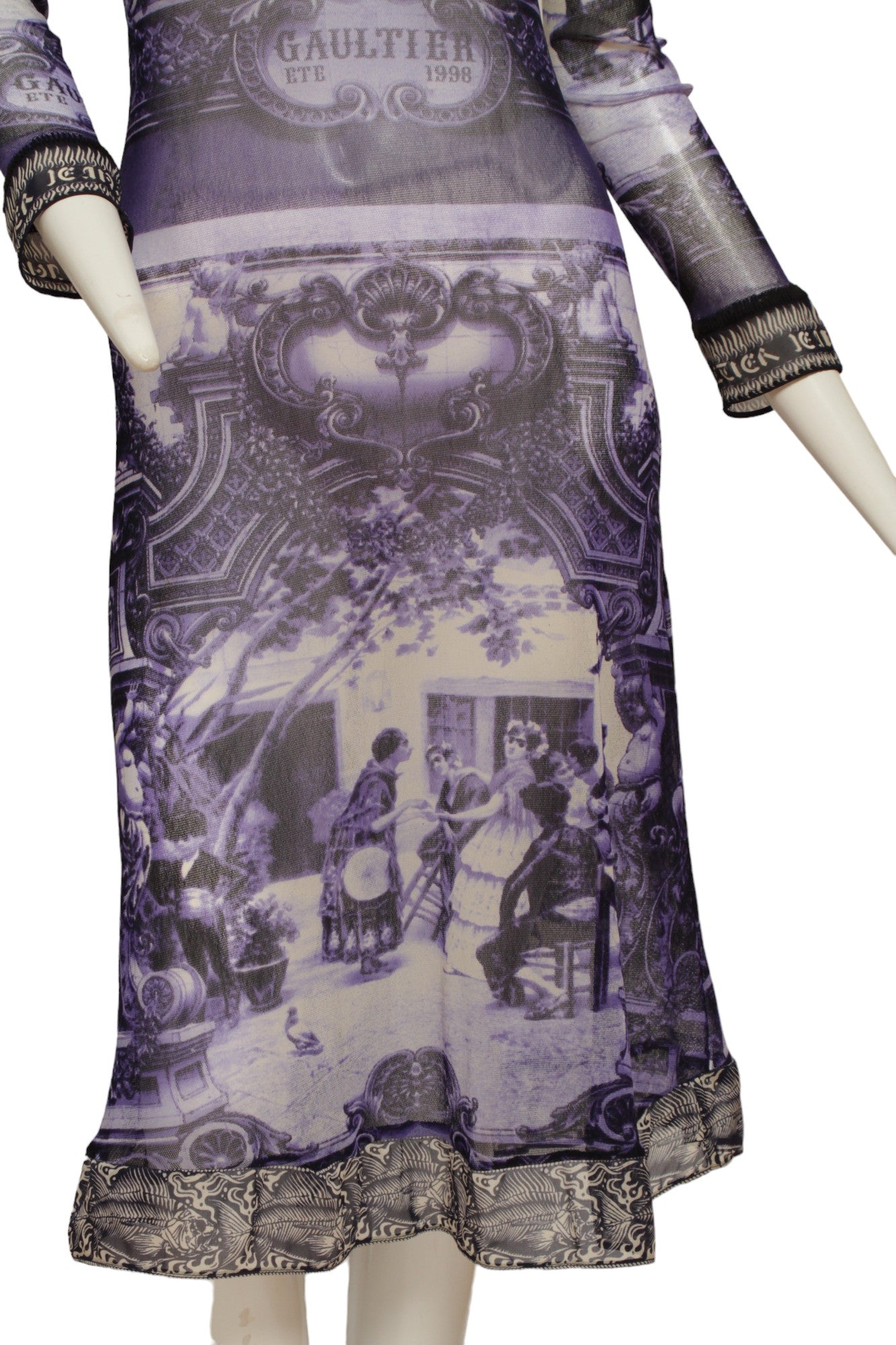 JEAN PAUL GAULTIER, French courtyard scene, long blue and white dress with black and white ruffle hem, Été (Summer) 1998