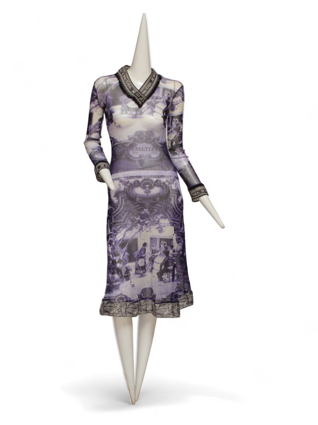 JEAN PAUL GAULTIER, French courtyard scene, long blue and white dress with black and white ruffle hem, Été (Summer) 1998