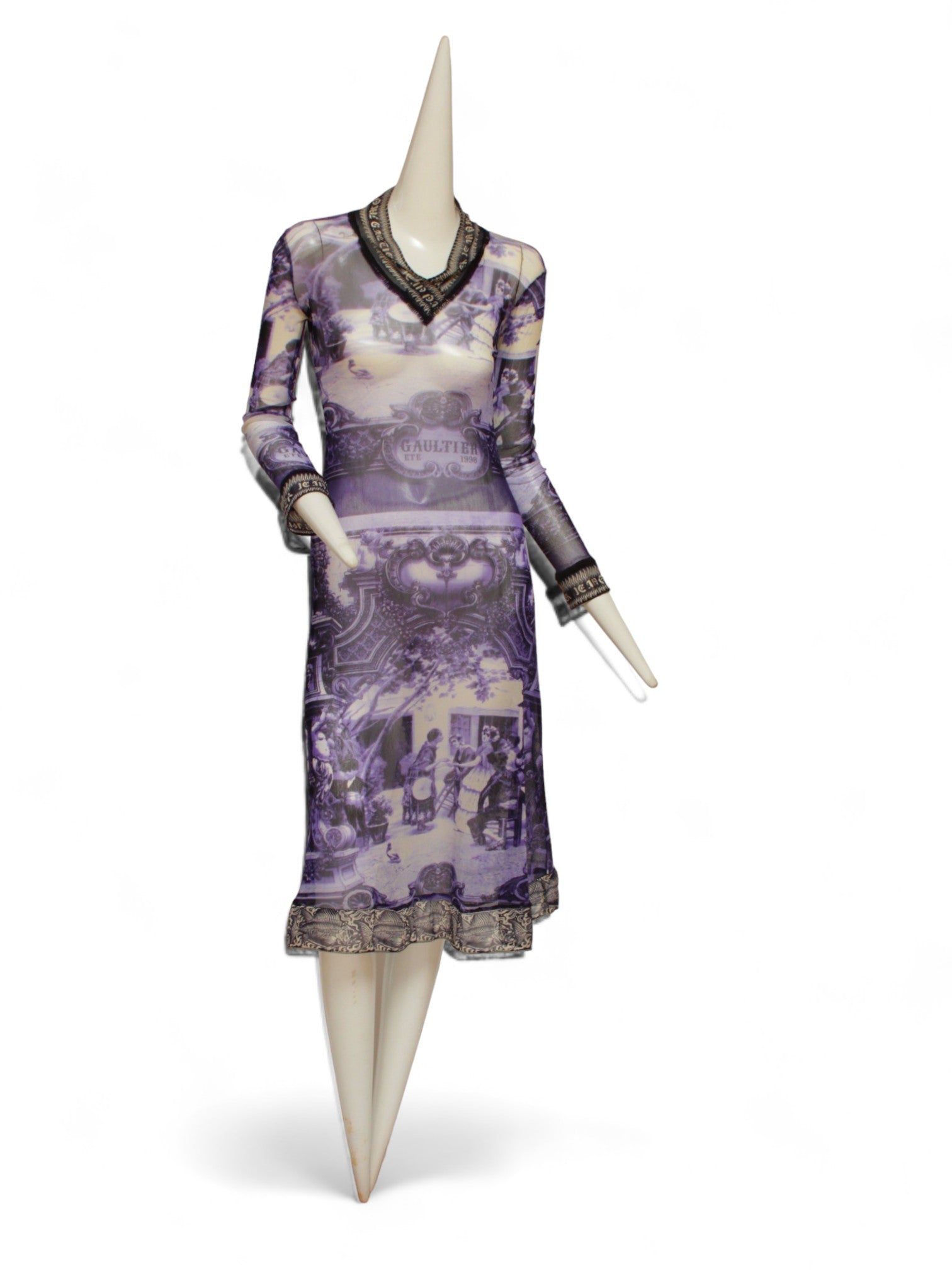 JEAN PAUL GAULTIER, French courtyard scene, long blue and white dress with black and white ruffle hem, Été (Summer) 1998