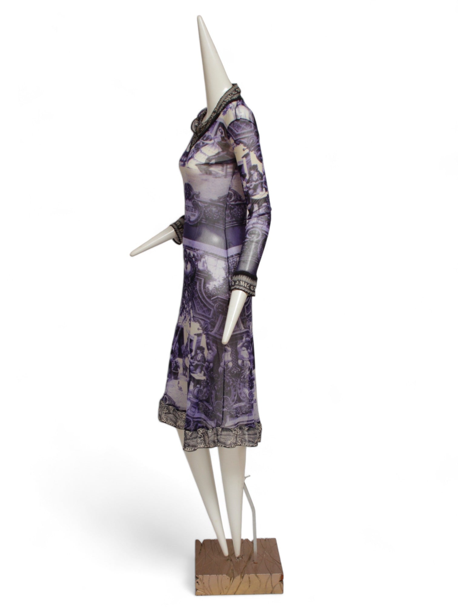JEAN PAUL GAULTIER, French courtyard scene, long blue and white dress with black and white ruffle hem, Été (Summer) 1998