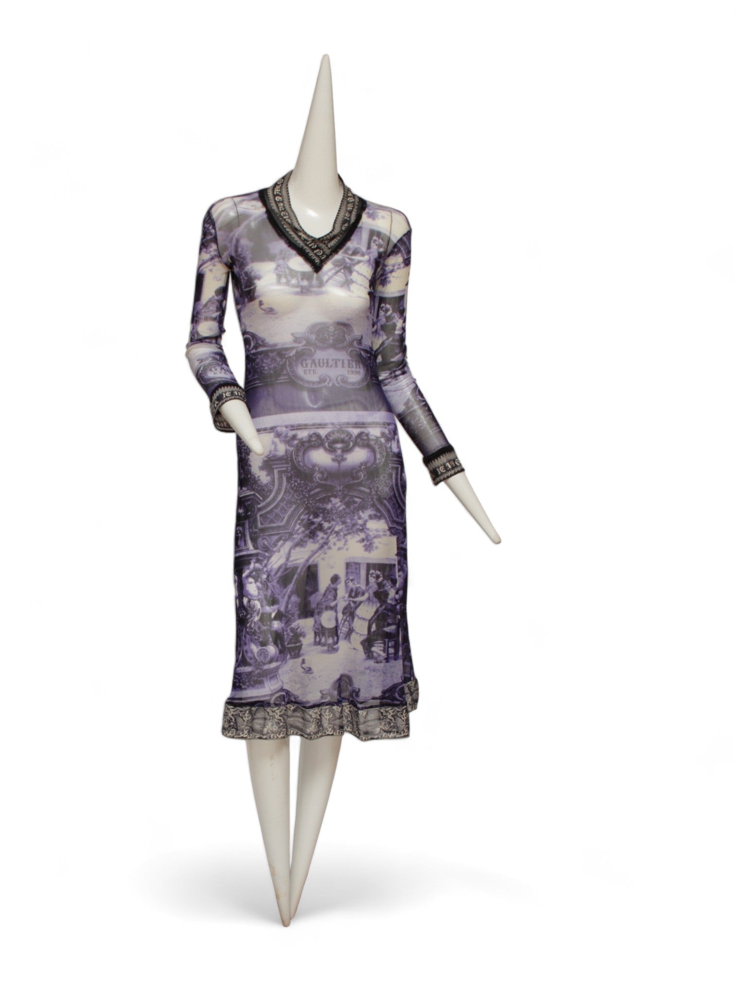 JEAN PAUL GAULTIER, French courtyard scene, long blue and white dress with black and white ruffle hem, Été (Summer) 1998