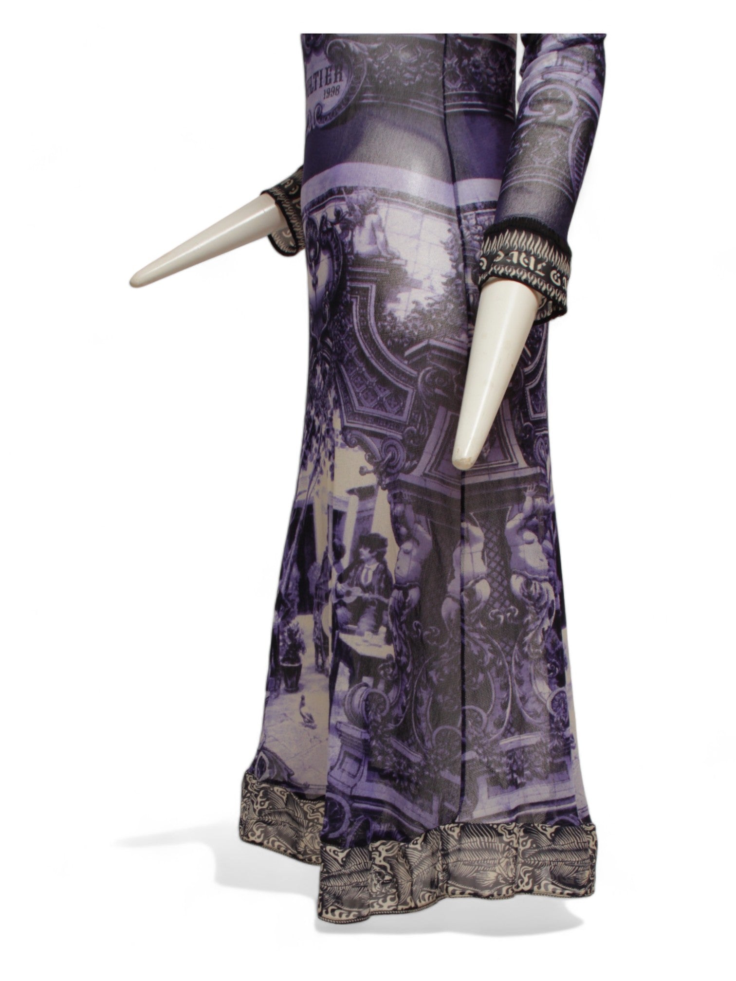 JEAN PAUL GAULTIER, French courtyard scene, long blue and white dress with black and white ruffle hem, Été (Summer) 1998