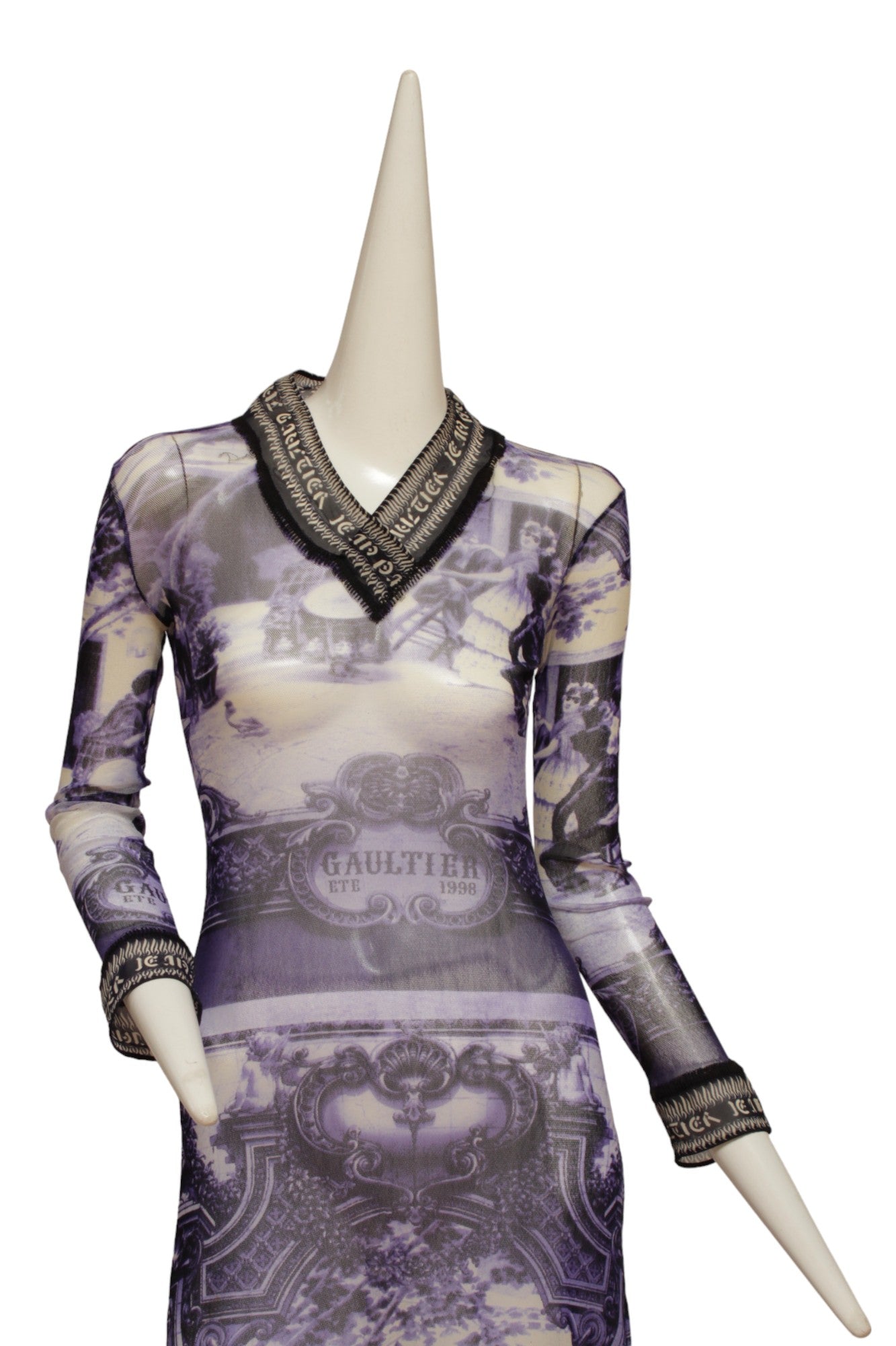 JEAN PAUL GAULTIER, French courtyard scene, long blue and white dress with black and white ruffle hem, Été (Summer) 1998