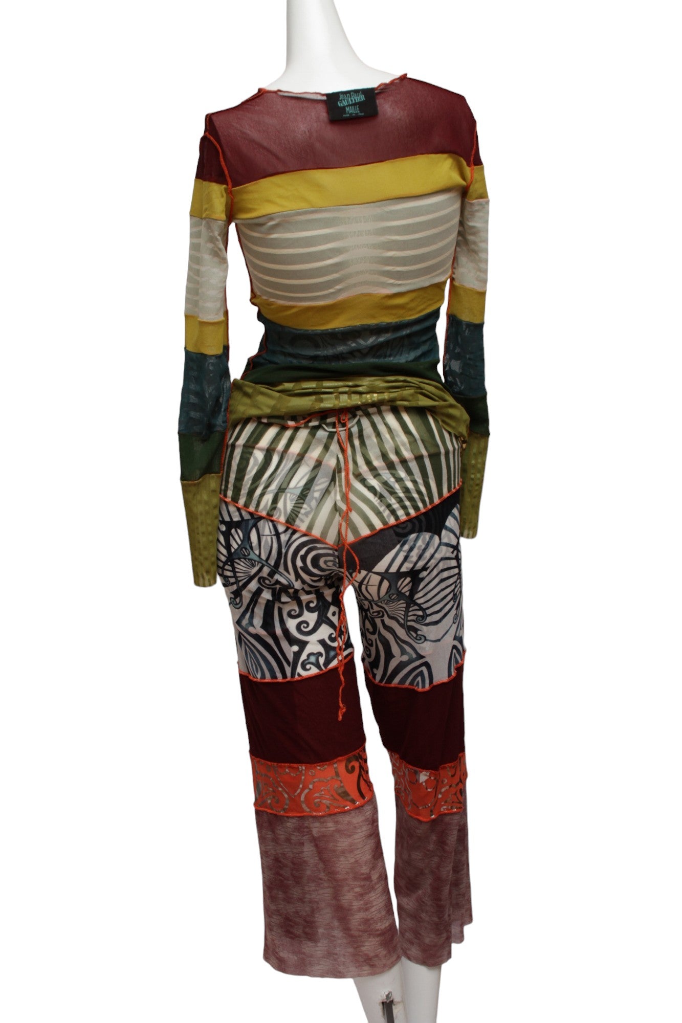 JEAN PAUL GAULTIER, Maille, 1996 CYBERBABA, long sleeve aboriginal print with metallic gold hem and cuffs