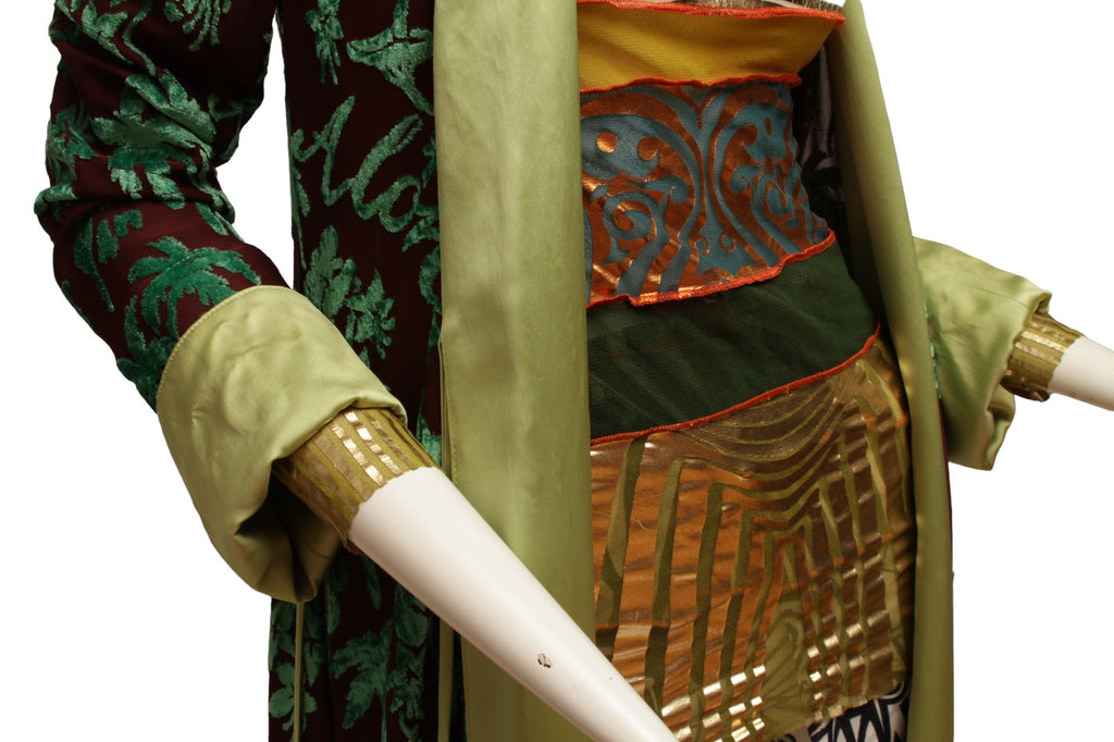 JEAN PAUL GAULTIER, Maille, 1996 CYBERBABA, long sleeve aboriginal print with metallic gold hem and cuffs