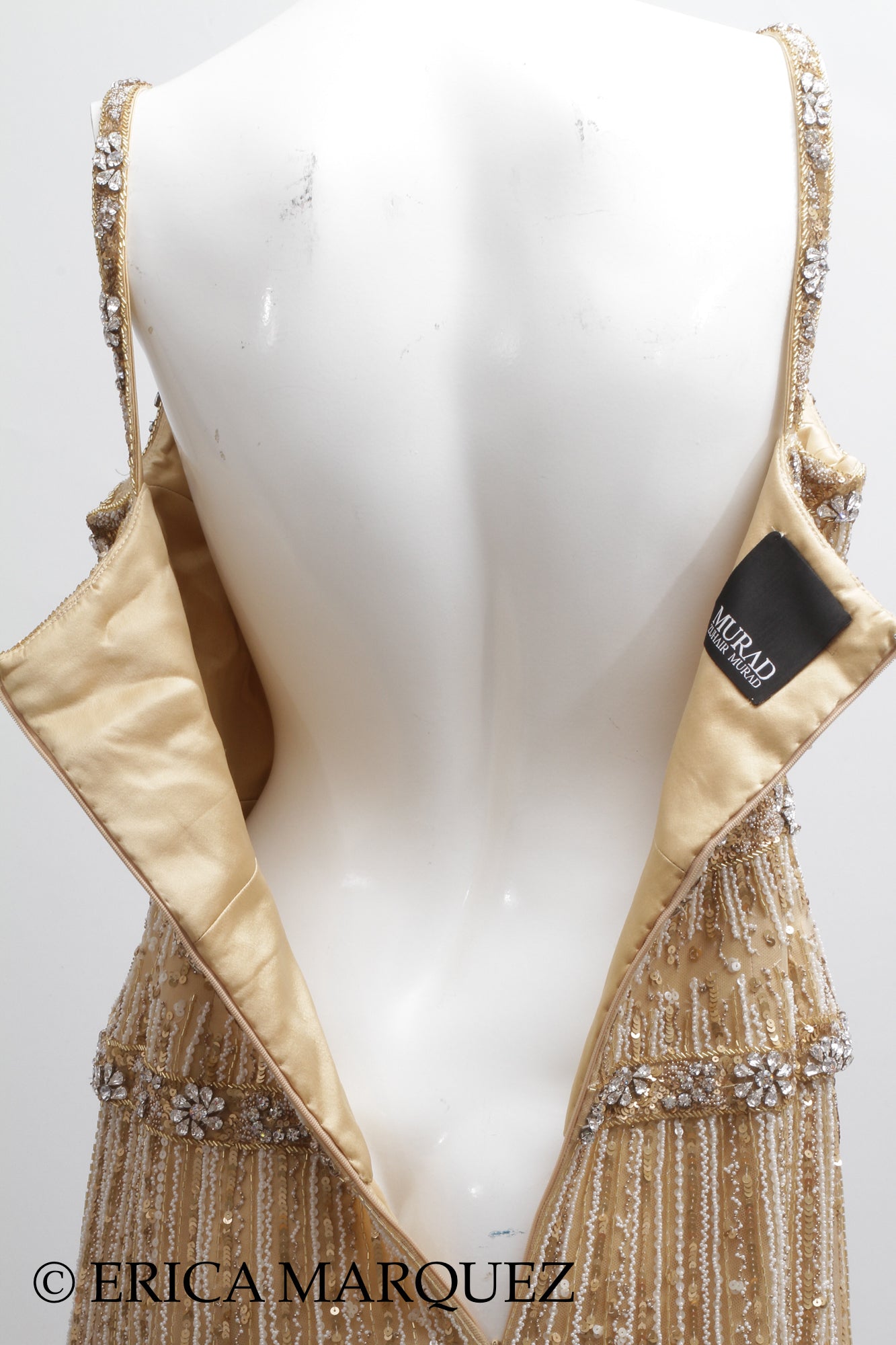 MURAD ZUHAIR, Metallic Gold Silk Floor Length Rhinestone Embellished Gown with Rhinestone Straps and Fitted Bodice