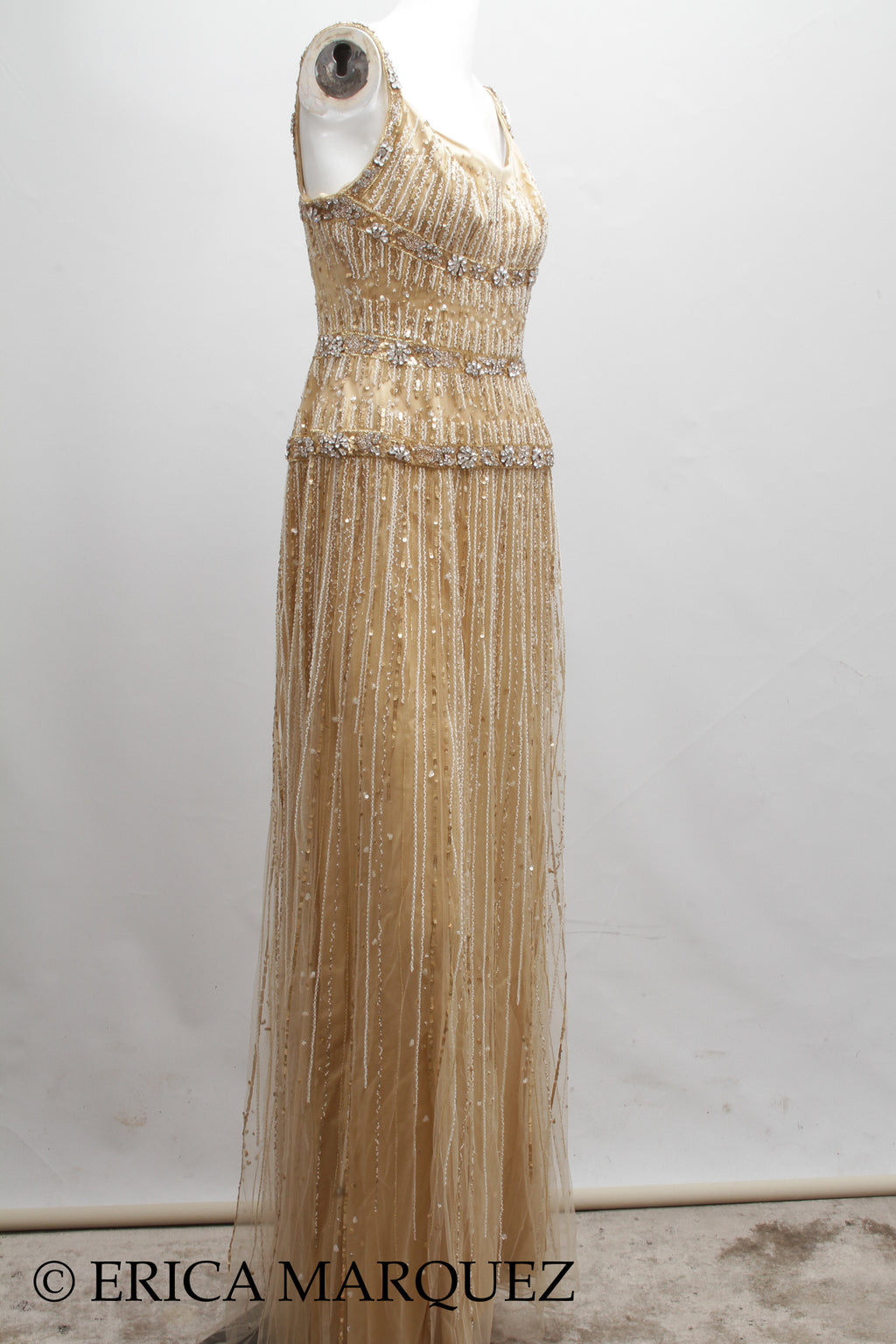 MURAD ZUHAIR, Metallic Gold Silk Floor Length Rhinestone Embellished Gown with Rhinestone Straps and Fitted Bodice