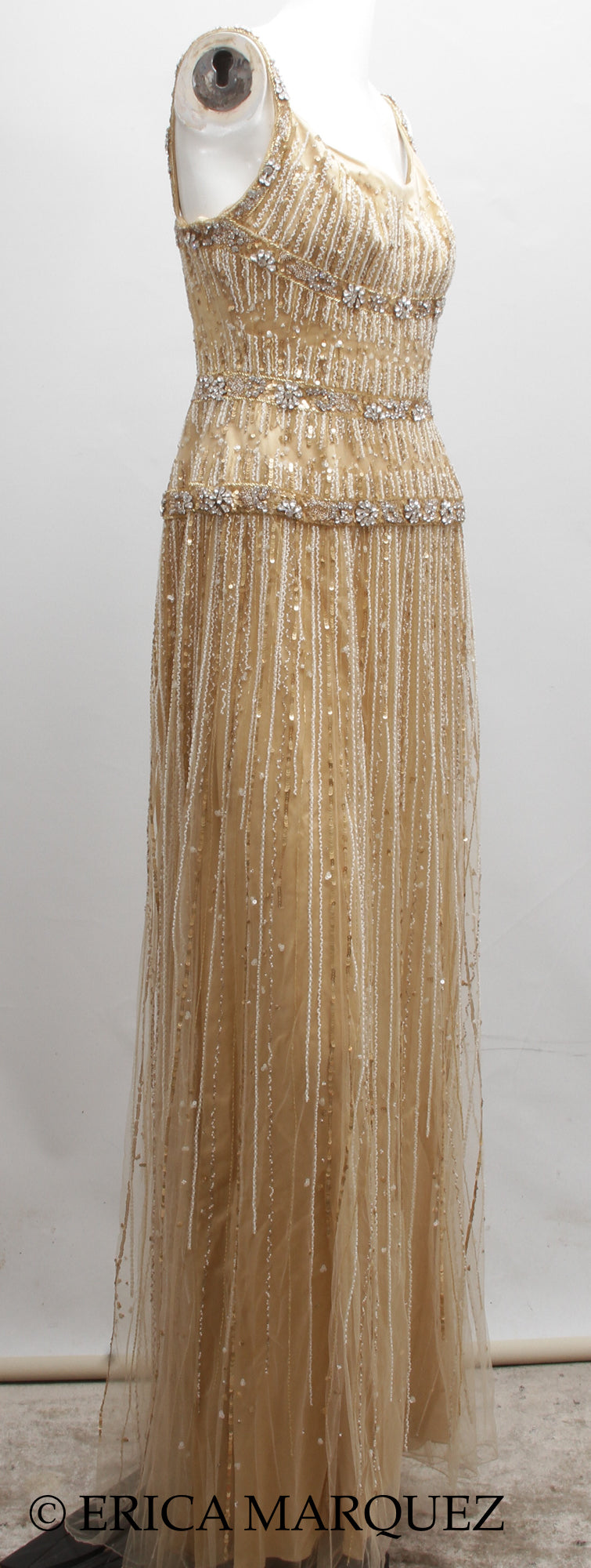 MURAD ZUHAIR, Metallic Gold Silk Floor Length Rhinestone Embellished Gown with Rhinestone Straps and Fitted Bodice