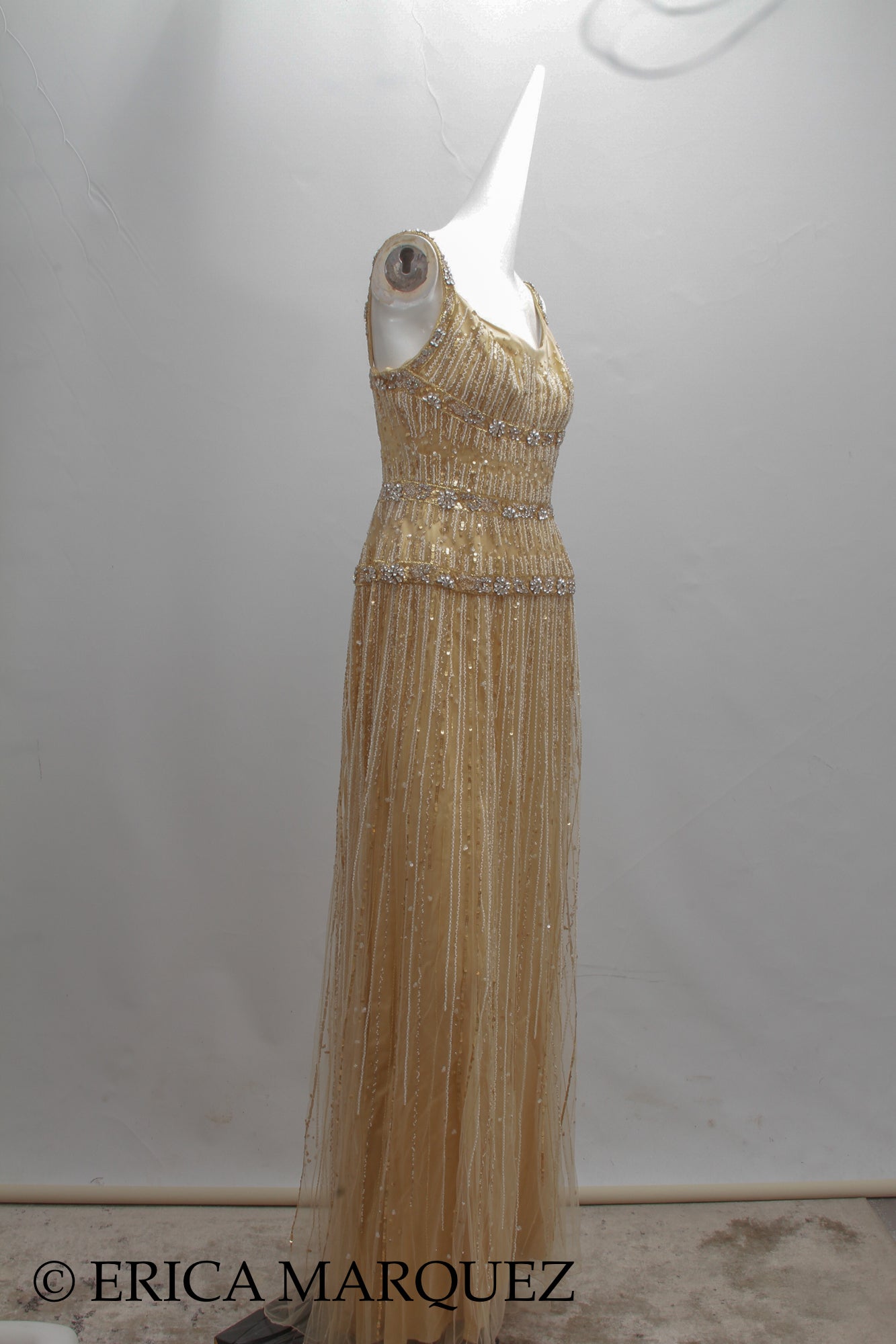 MURAD ZUHAIR, Metallic Gold Silk Floor Length Rhinestone Embellished Gown with Rhinestone Straps and Fitted Bodice
