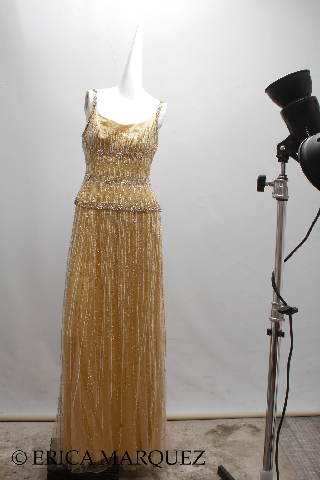 MURAD ZUHAIR, Metallic Gold Silk Floor Length Rhinestone Embellished Gown with Rhinestone Straps and Fitted Bodice