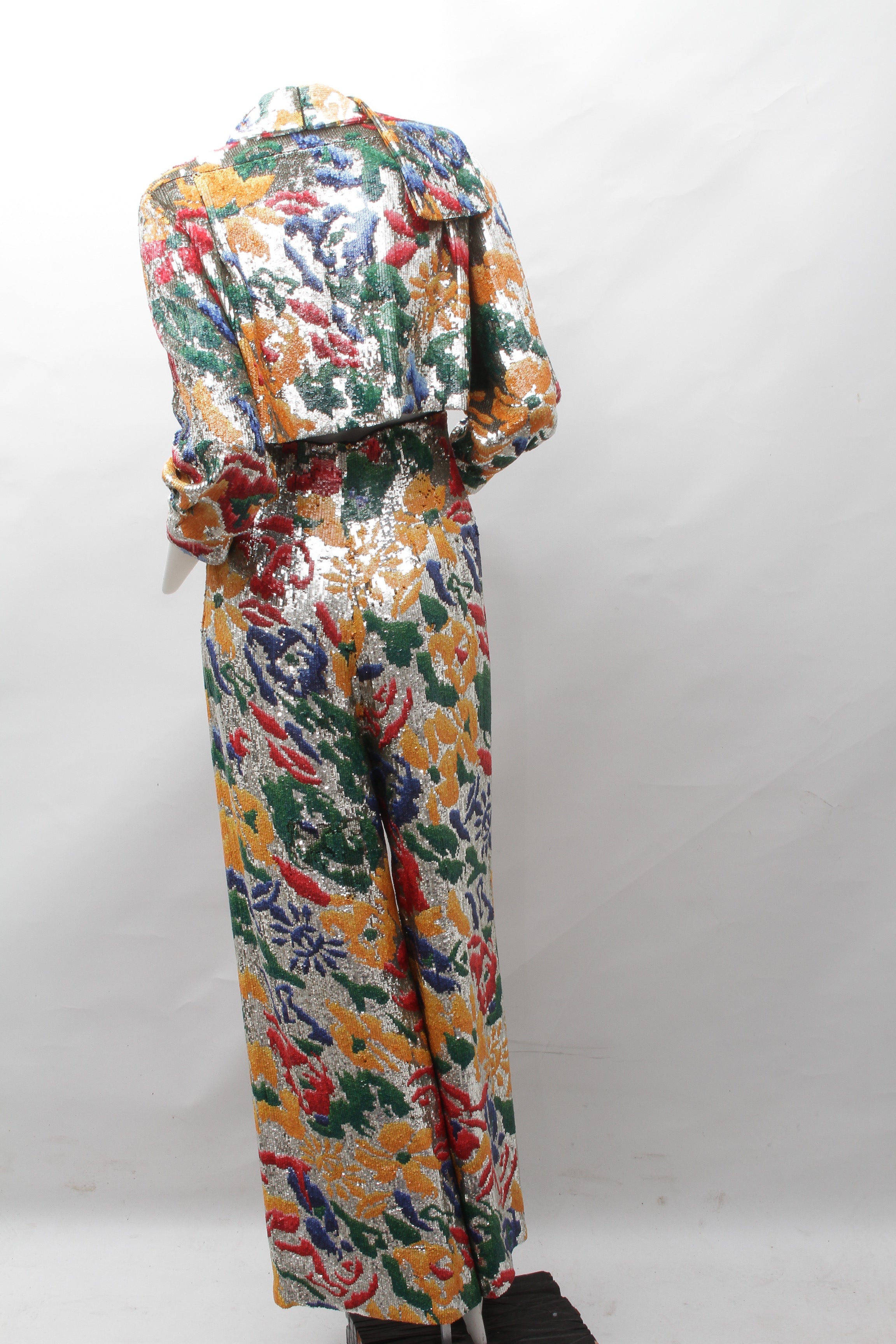 SCHIAPARELLI, embroidered sequin suit with a surrealist floral print, S/S 2022