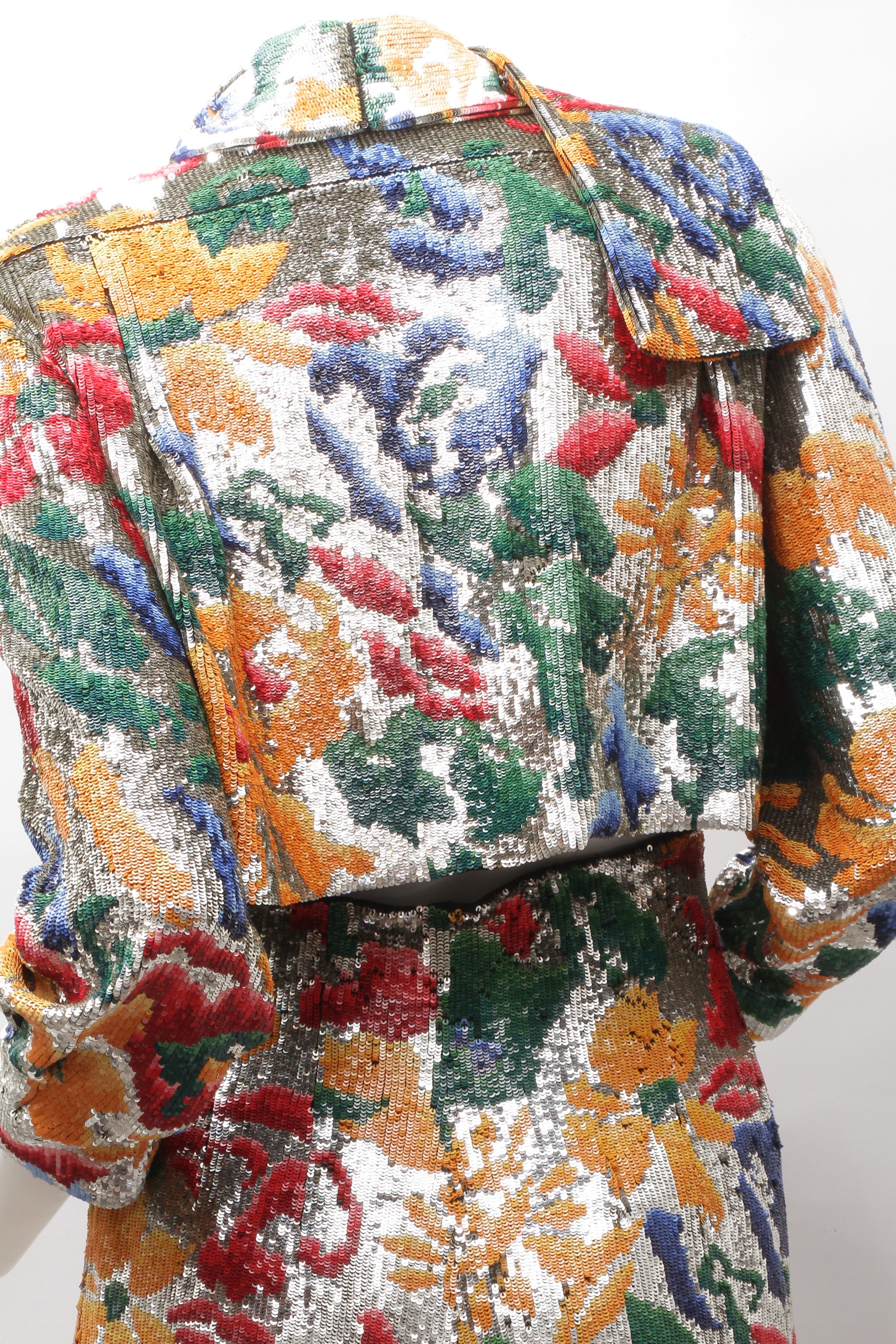 SCHIAPARELLI, embroidered sequin suit with a surrealist floral print, S/S 2022