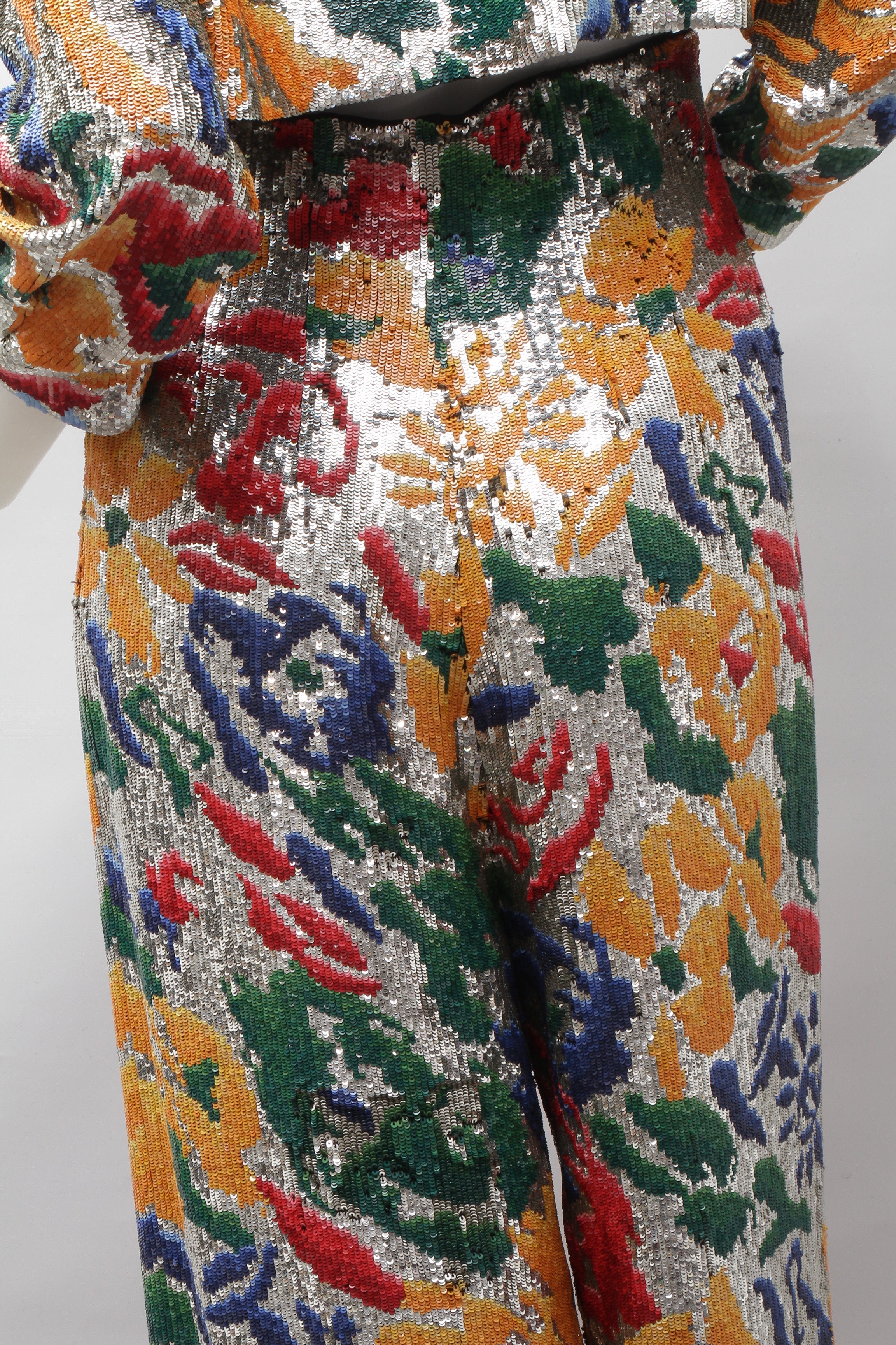 SCHIAPARELLI, embroidered sequin suit with a surrealist floral print, S/S 2022