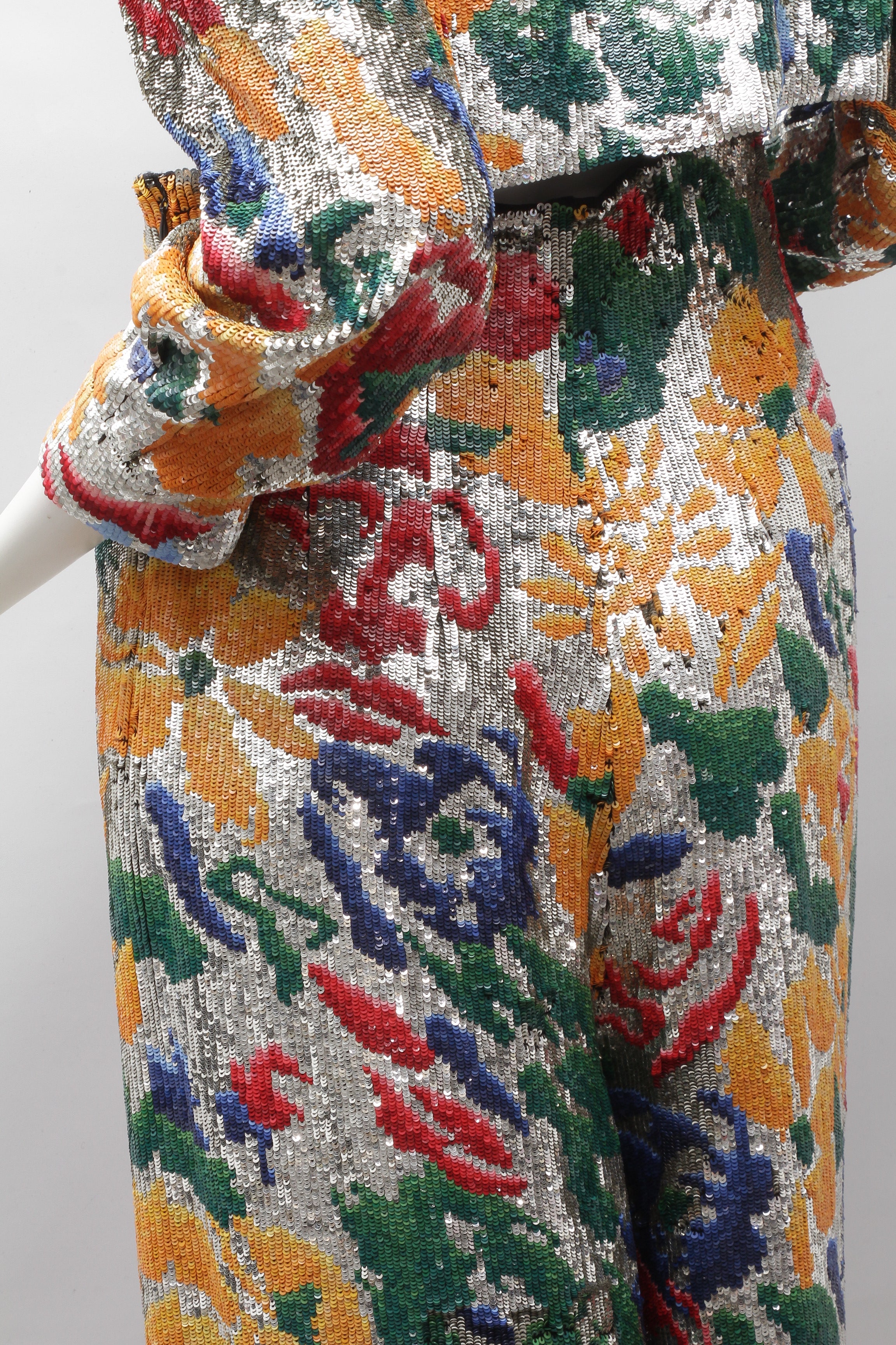 SCHIAPARELLI, embroidered sequin suit with a surrealist floral print, S/S 2022