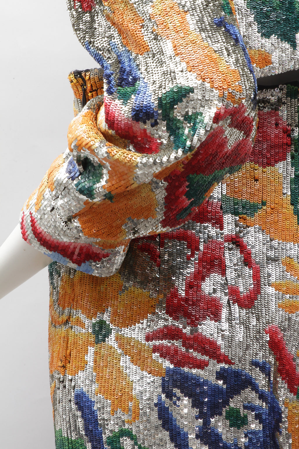 SCHIAPARELLI, embroidered sequin suit with a surrealist floral print, S/S 2022