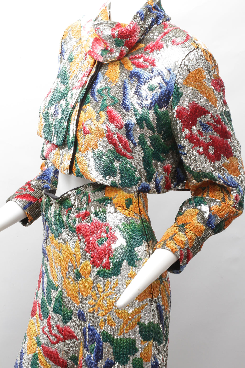 SCHIAPARELLI, embroidered sequin suit with a surrealist floral print, S/S 2022