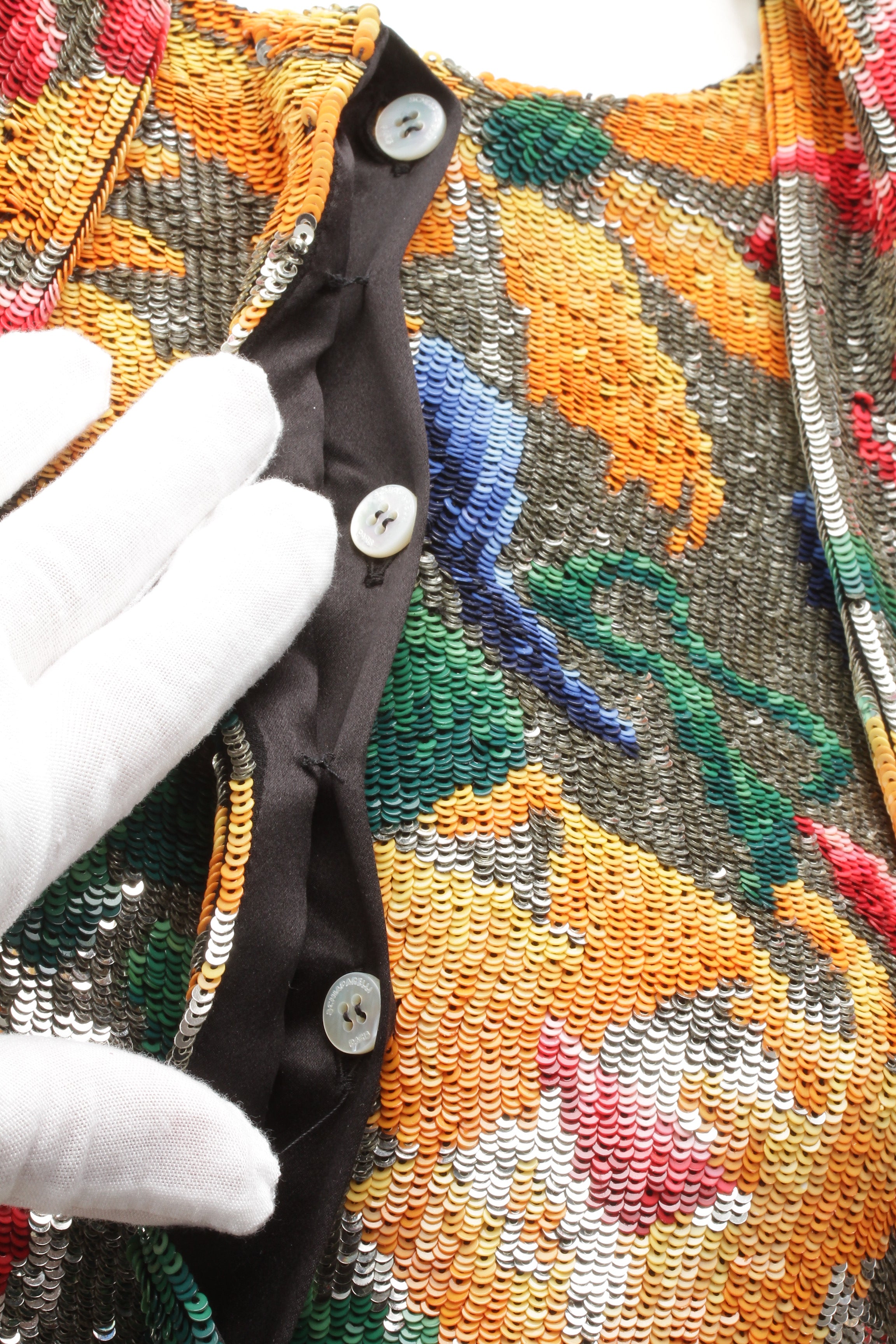 SCHIAPARELLI, embroidered sequin suit with a surrealist floral print, S/S 2022