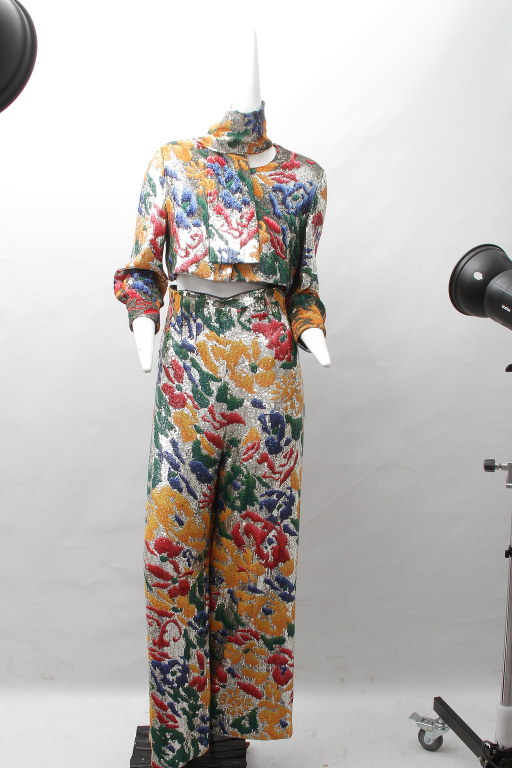 SCHIAPARELLI, embroidered sequin suit with a surrealist floral print, S/S 2022
