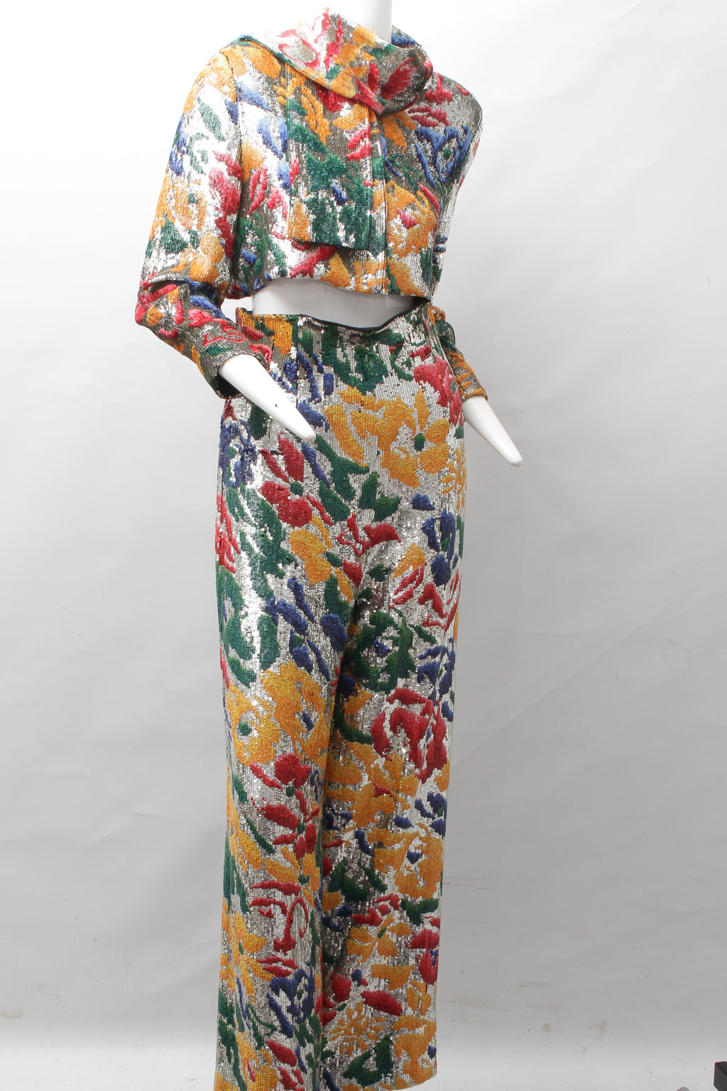 SCHIAPARELLI, embroidered sequin suit with a surrealist floral print, S/S 2022