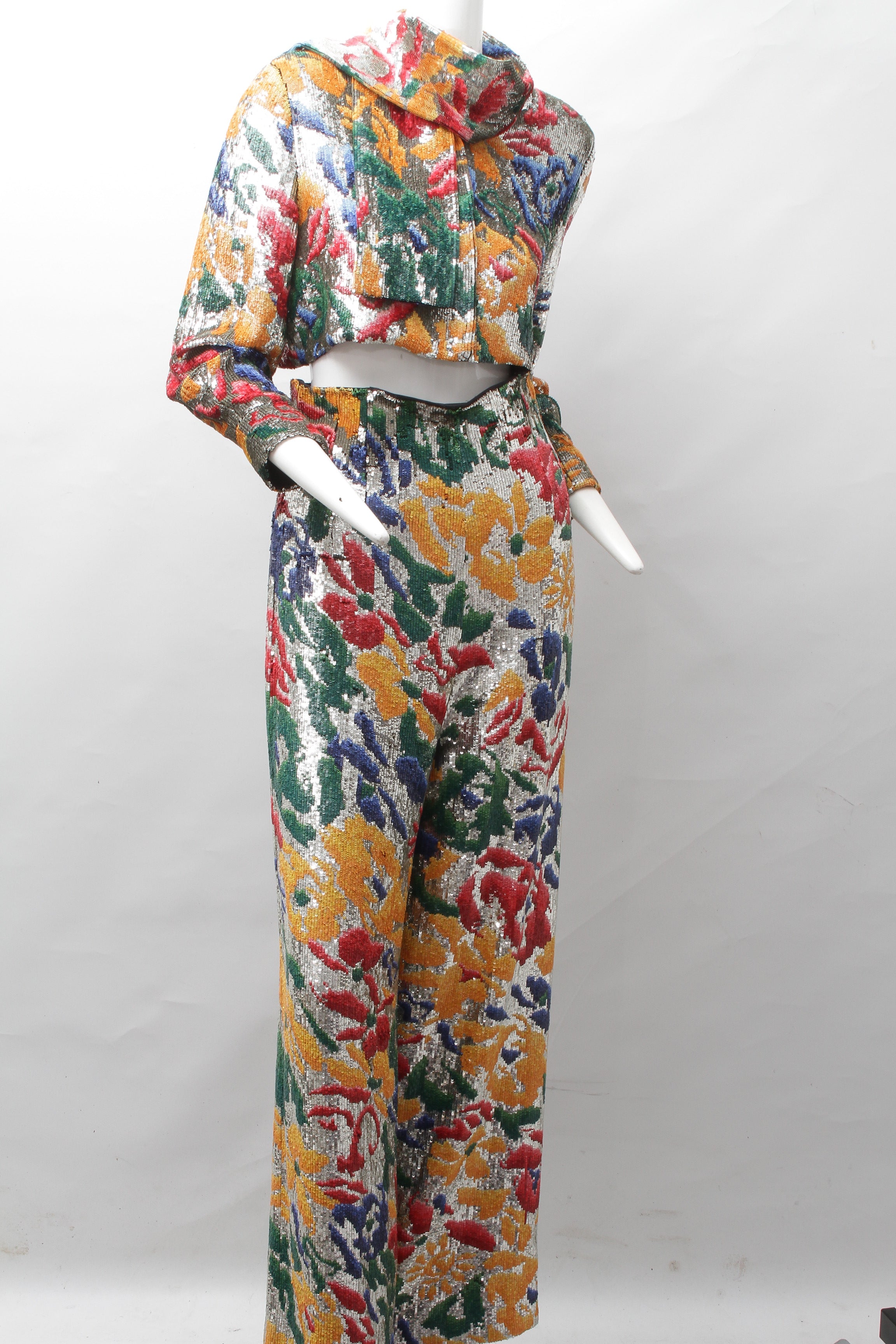 SCHIAPARELLI, embroidered sequin suit with a surrealist floral print, S/S 2022
