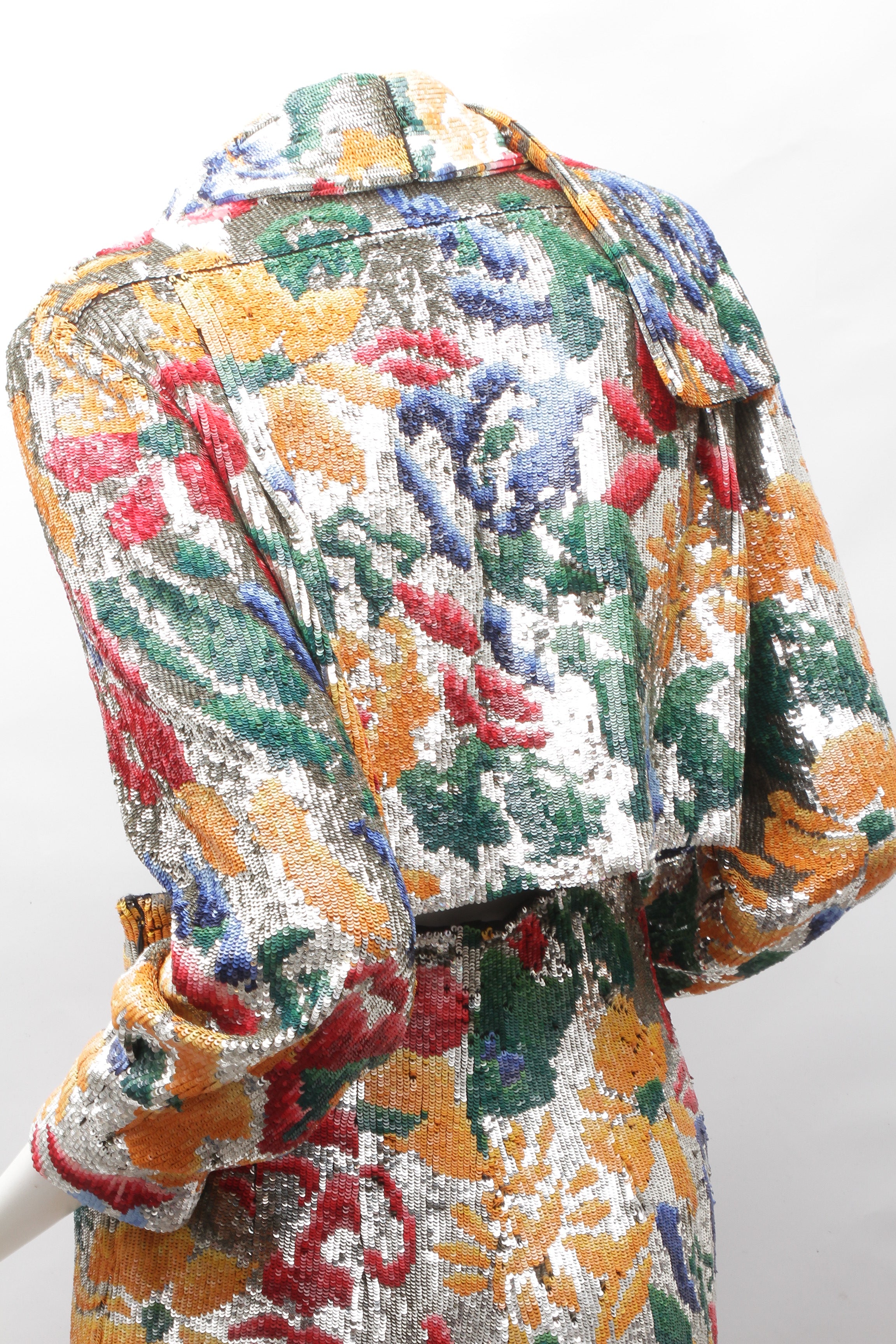 SCHIAPARELLI, embroidered sequin suit with a surrealist floral print, S/S 2022