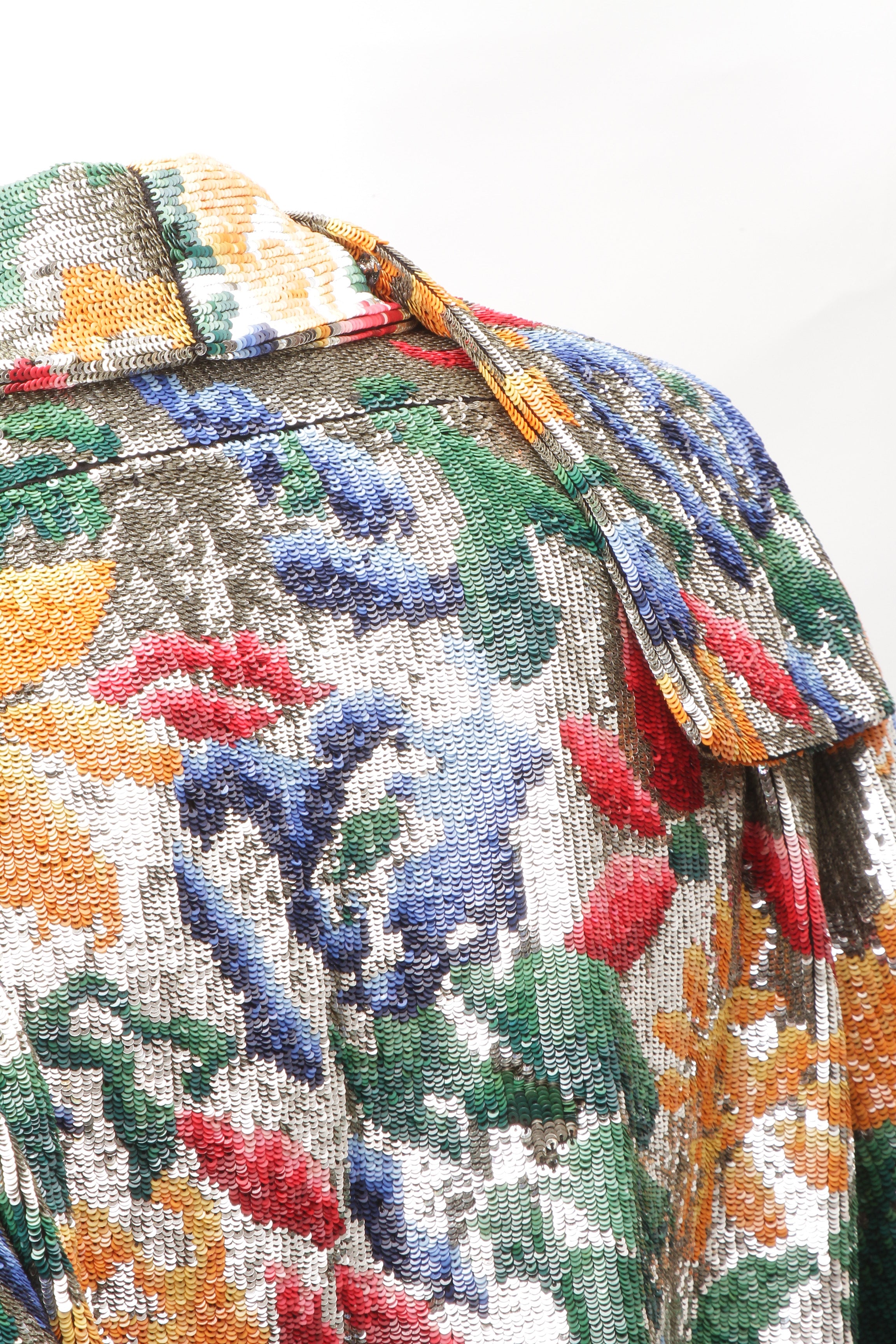 SCHIAPARELLI, embroidered sequin suit with a surrealist floral print, S/S 2022