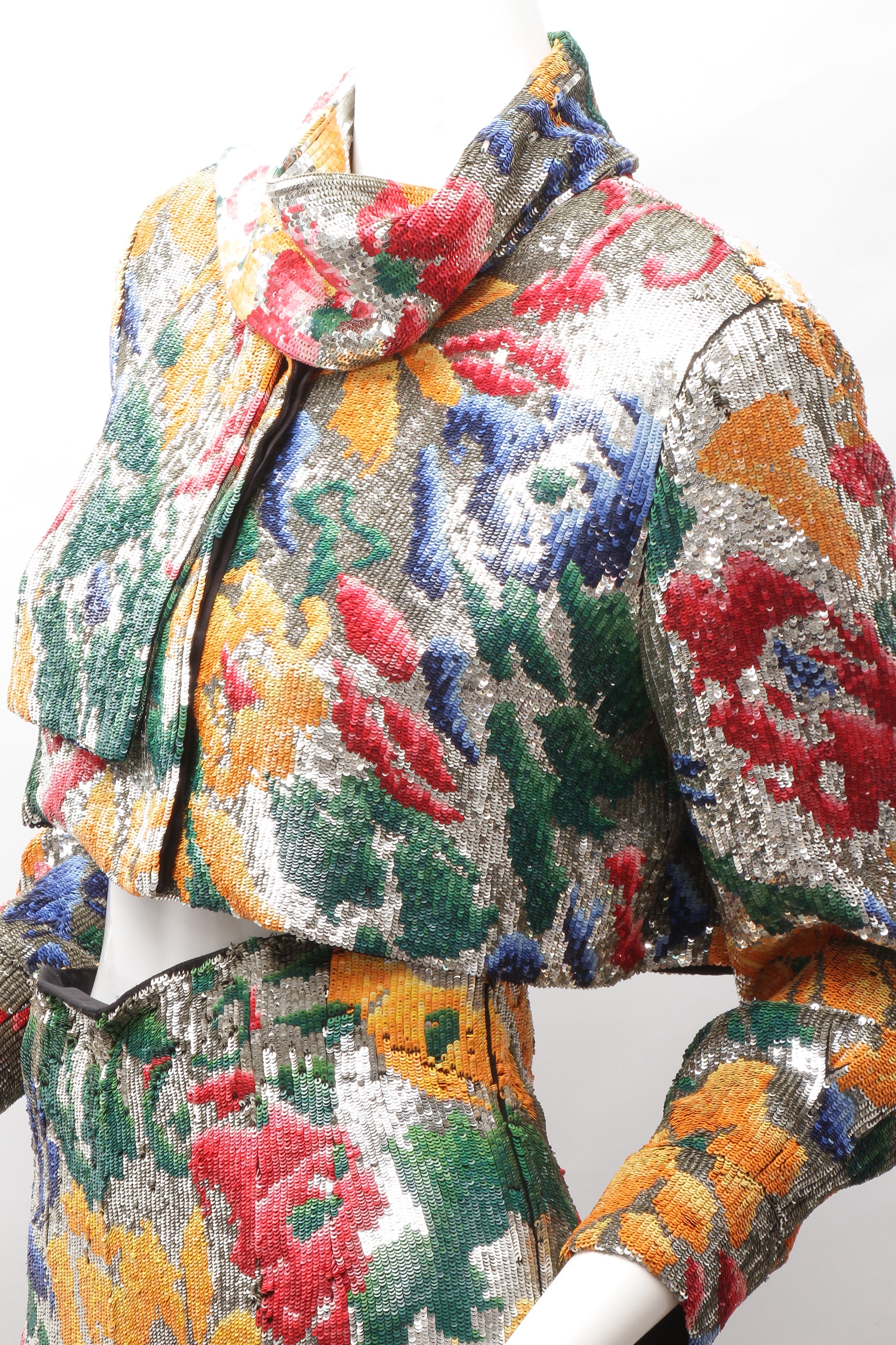 SCHIAPARELLI, embroidered sequin suit with a surrealist floral print, S/S 2022