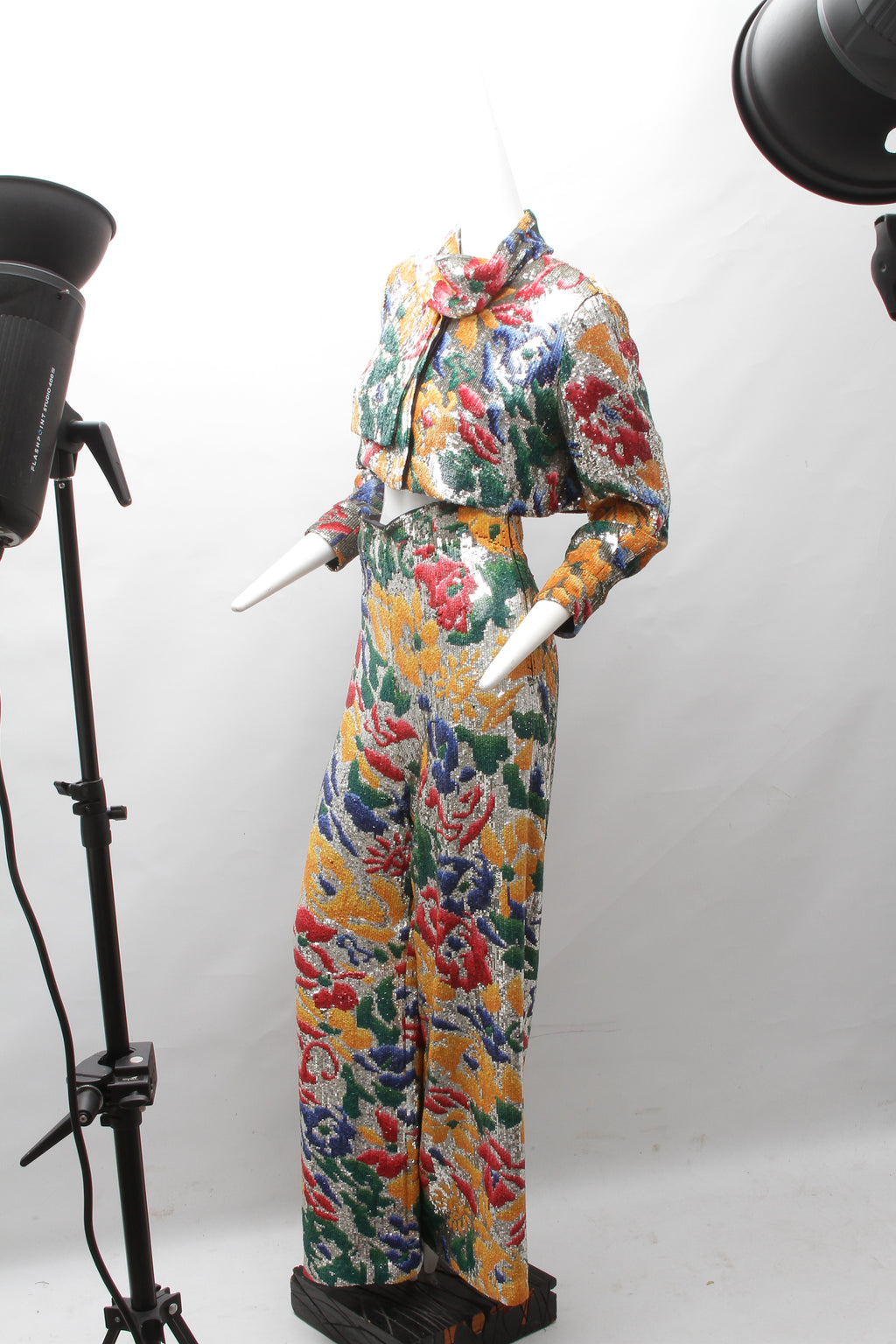 SCHIAPARELLI, embroidered sequin suit with a surrealist floral print, S/S 2022