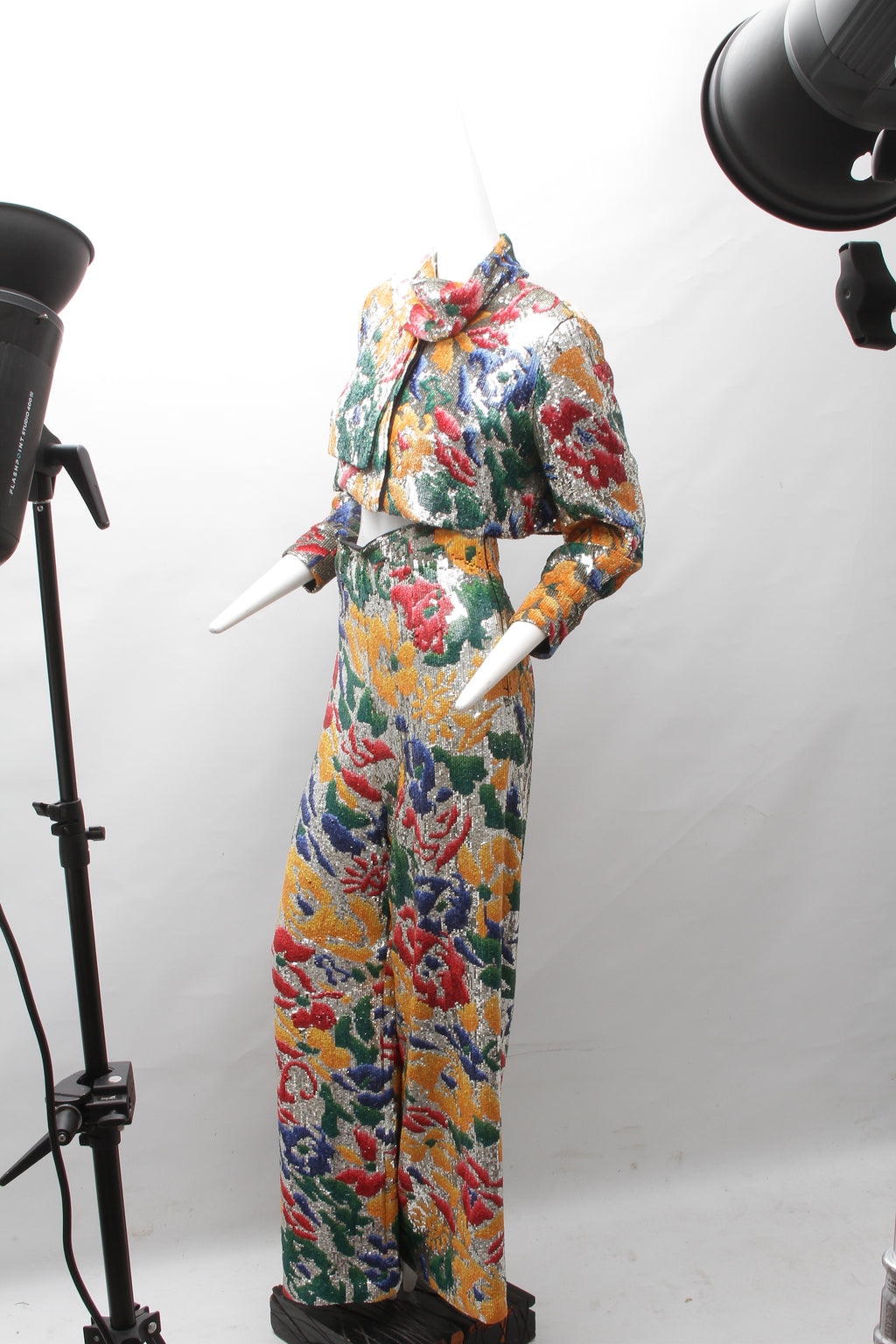 SCHIAPARELLI, embroidered sequin suit with a surrealist floral print, S/S 2022