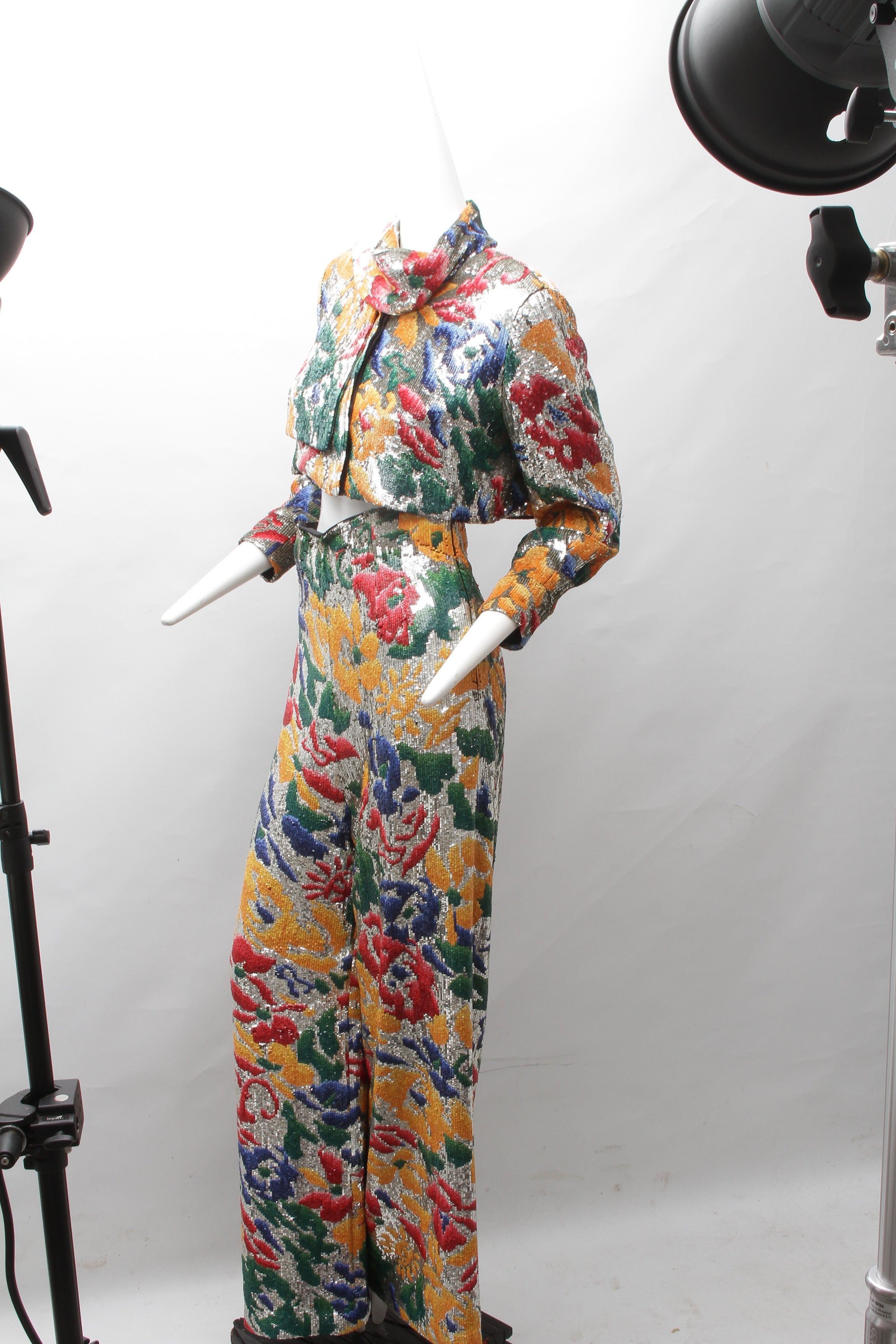 SCHIAPARELLI, embroidered sequin suit with a surrealist floral print, S/S 2022