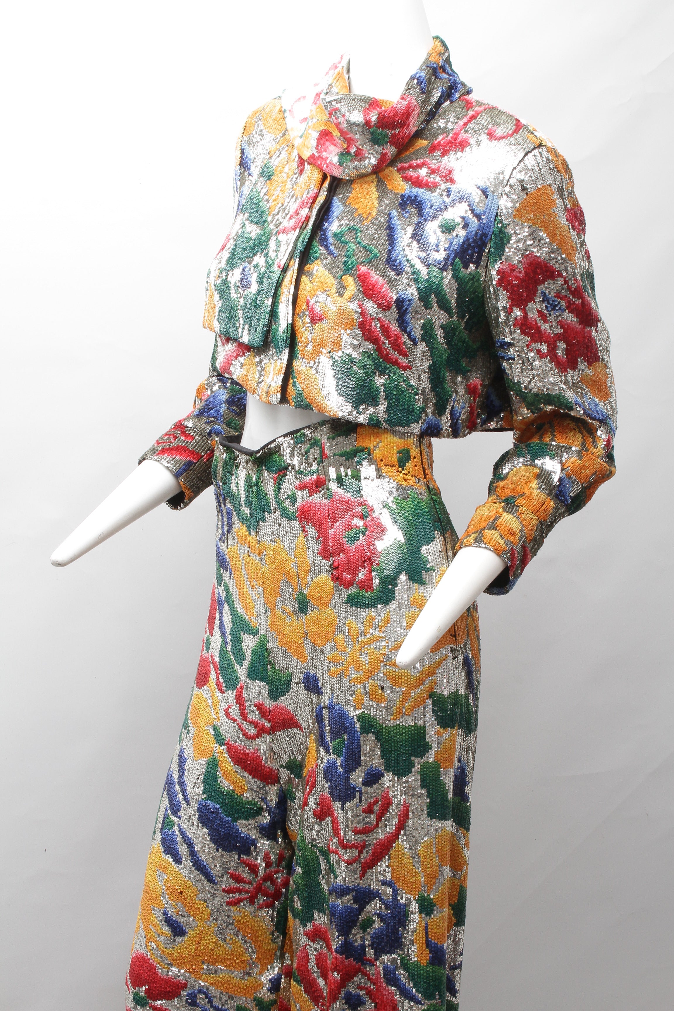 SCHIAPARELLI, embroidered sequin suit with a surrealist floral print, S/S 2022