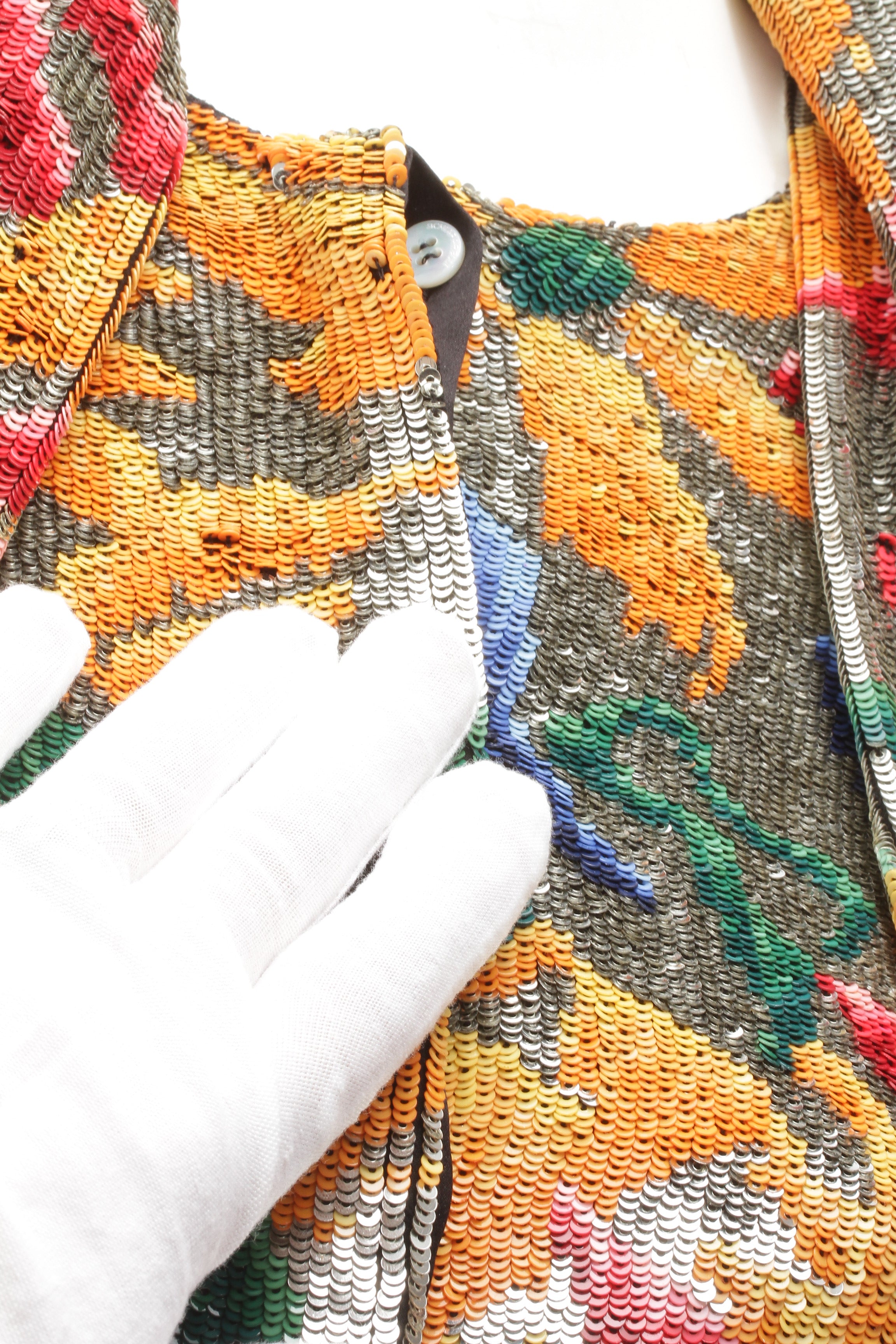SCHIAPARELLI, embroidered sequin suit with a surrealist floral print, S/S 2022