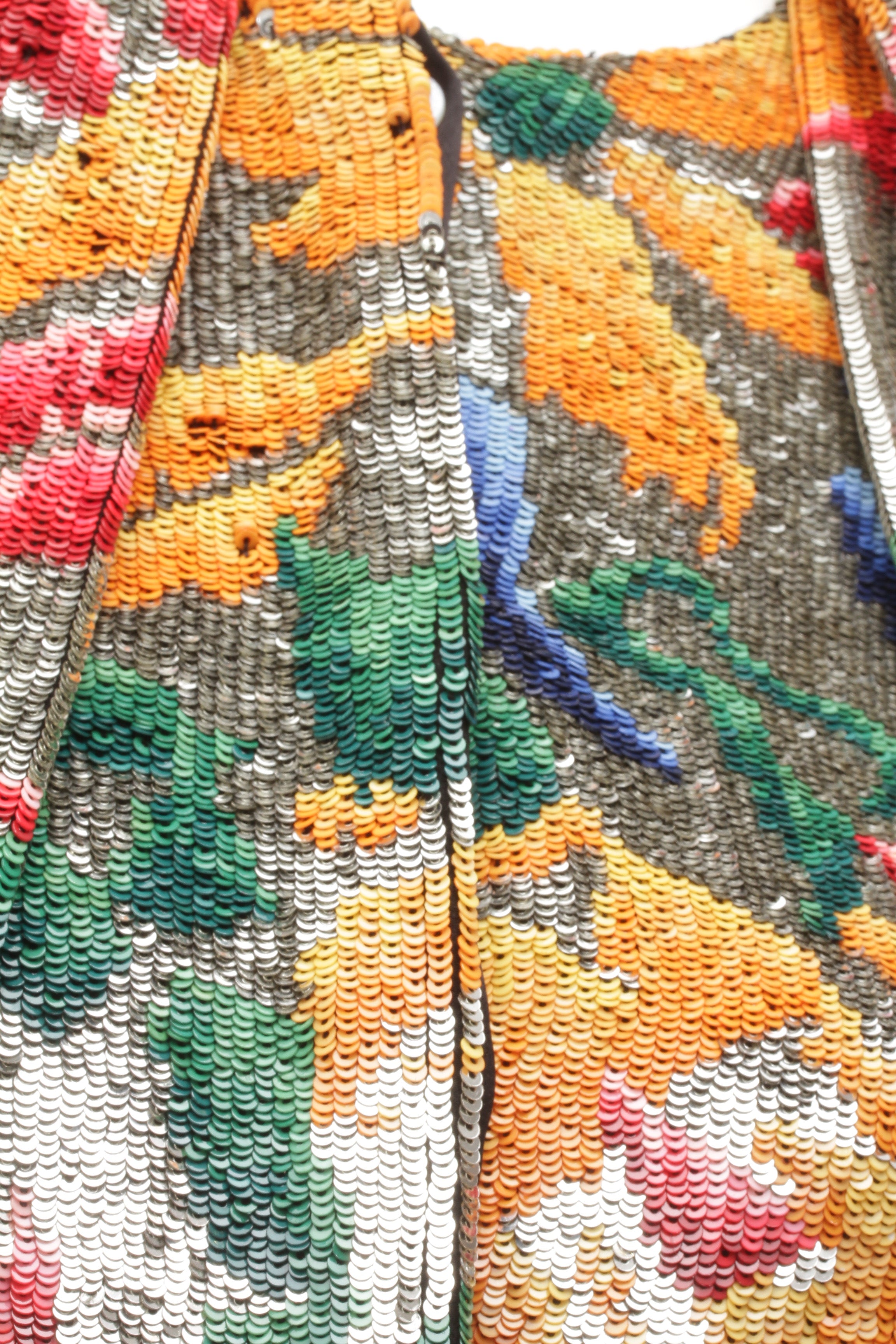 SCHIAPARELLI, embroidered sequin suit with a surrealist floral print, S/S 2022