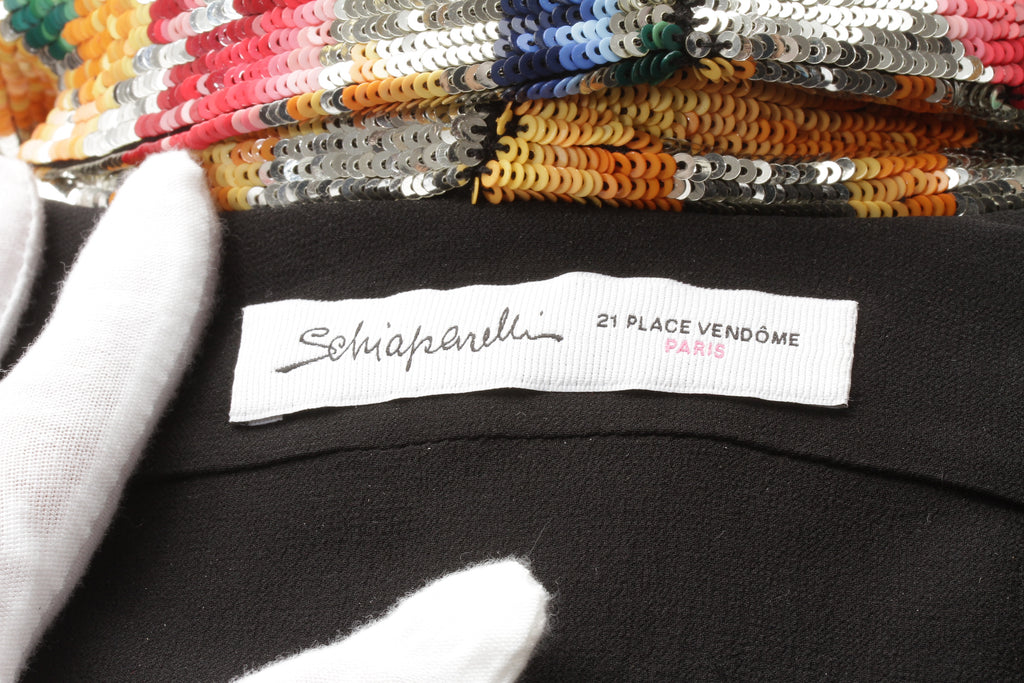 SCHIAPARELLI, embroidered sequin suit with a surrealist floral print, S/S 2022